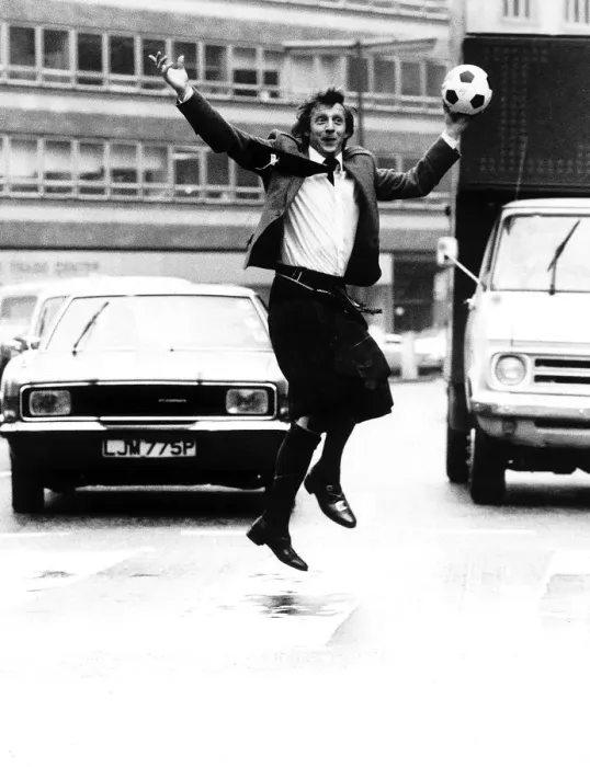 Framed Print : Denis Law wearing kilt in Regent Street London 1978 hours before leaving with Framed Print : Denis Law wearing kilt in Regent Street London 1978 hours before leaving with