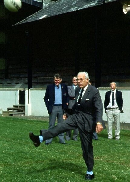Denis Thatcher kicking rugby ball September 1986 husband of Conservative Prime