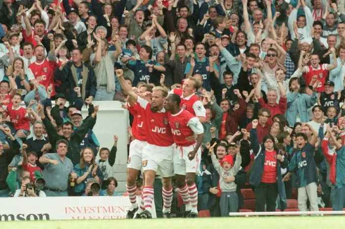 Framed Print : Dennis Bergkamp celebrates his first ever goal for his new club Arsenal