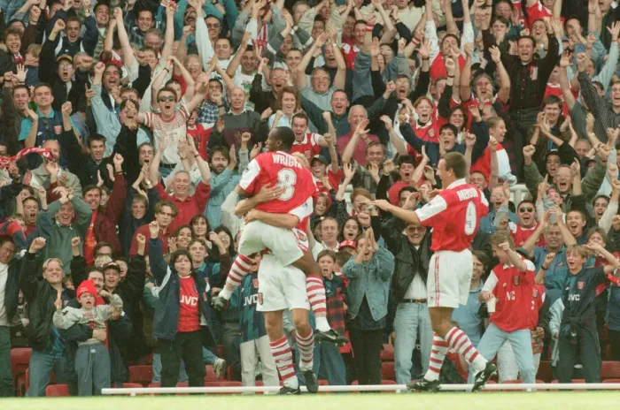 Framed Print : Dennis Bergkamp celebrates his first ever goal for his new club Arsenal Framed Print : Dennis Bergkamp celebrates his first ever goal for his new club Arsenal