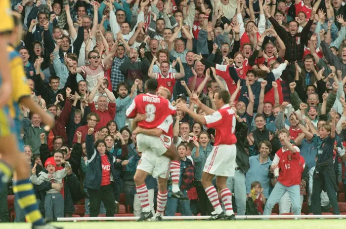 Framed Print : Dennis Bergkamp celebrates his first ever goal for his new club Arsenal Framed Print : Dennis Bergkamp celebrates his first ever goal for his new club Arsenal