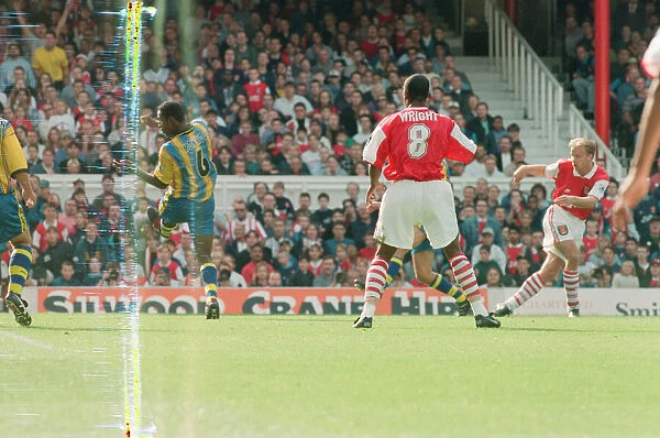 Dennis Bergkamp scores his first ever goal for his new club Arsenal