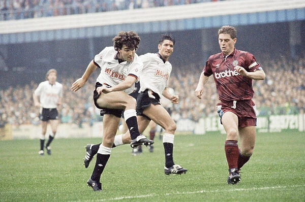 Derby County footballer Dean Saunders shoots for goal during his side