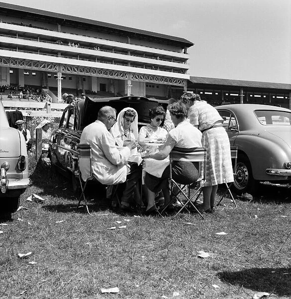 Derby Day at Epsom. Pictured, a family enjoy lunch. 3rd June 1959