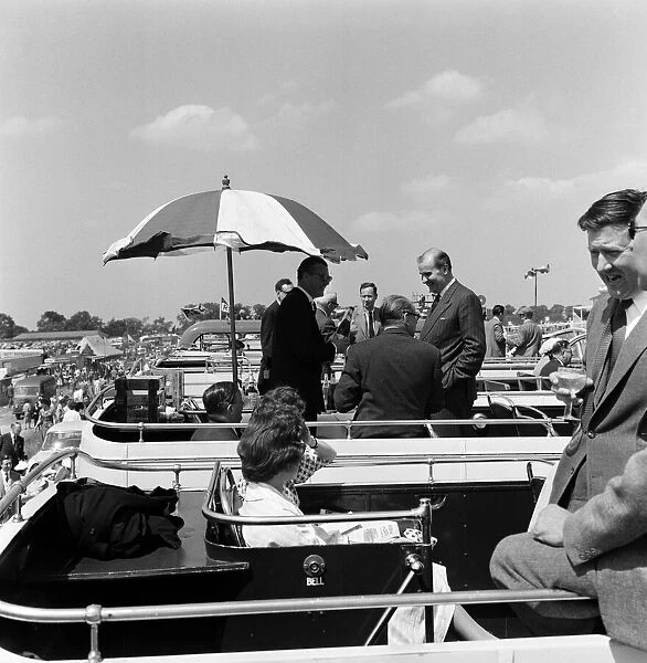 Derby Day at Epsom. Pictured, a sunshade over the bar on a bus. 3rd June 1959