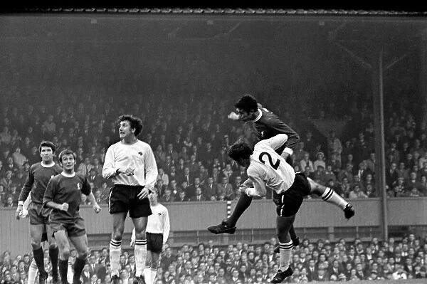 Derby v. Liverpool. McGovern powers on loose ball to save Derby first goal