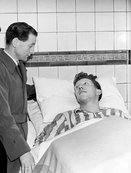 Derek Dooley is visited in hospital by Preston and England Winger Tom Finney after Dooley