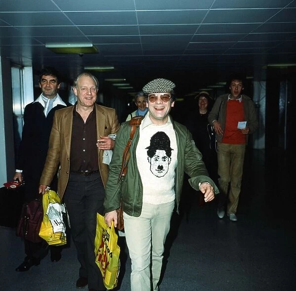 Derek Nimmo, Frank Windsor and David Jason at London Airport. 26th January 1983