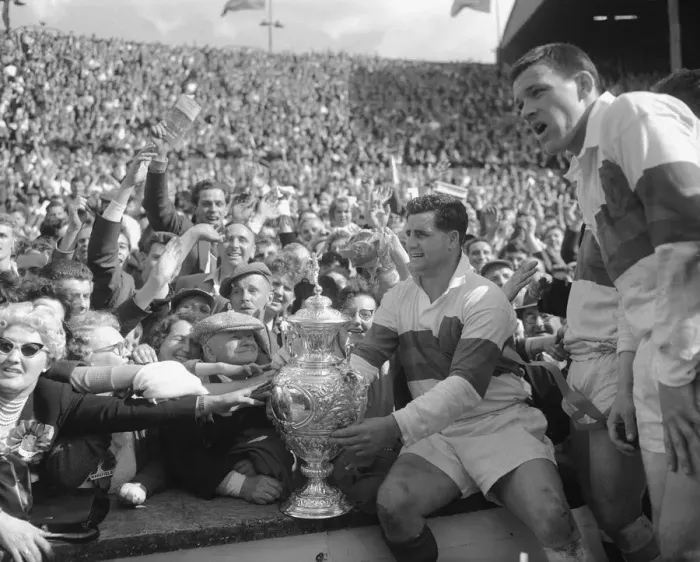 Framed Print : Derek Turner of Wakefield Trinity shows the trophy to fans after their 25 - 10 victory