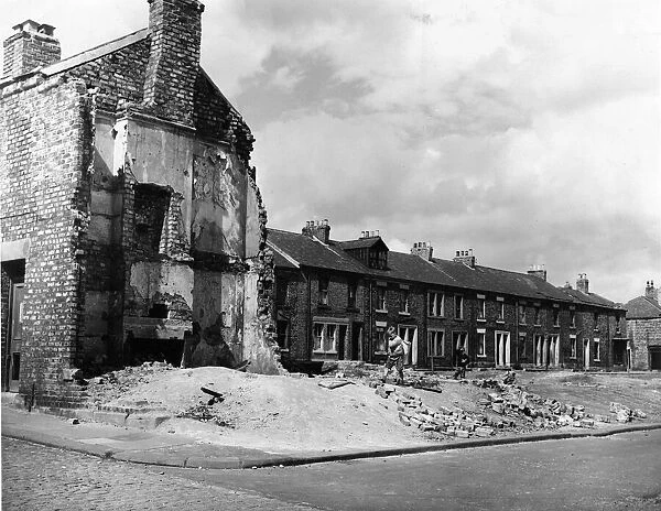 Derelict housing in an area of Laurel Street, Newcastle - youngsters scavenge throught