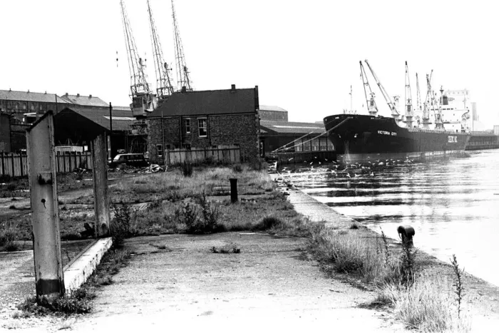Framed Print : Dereliction along the quayside in Newcastle. The Victoria City ship moored Framed Print : Dereliction along the quayside in Newcastle. The Victoria City ship moored