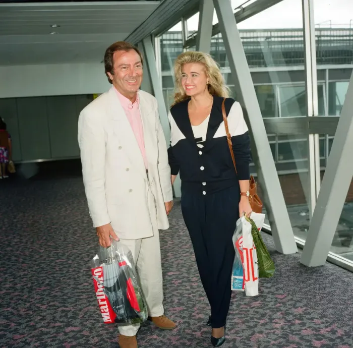 Framed Print : Des O Connor and girlfriend Jodie Brooke Wilson and Heathrow Airport Framed Print : Des O Connor and girlfriend Jodie Brooke Wilson and Heathrow Airport