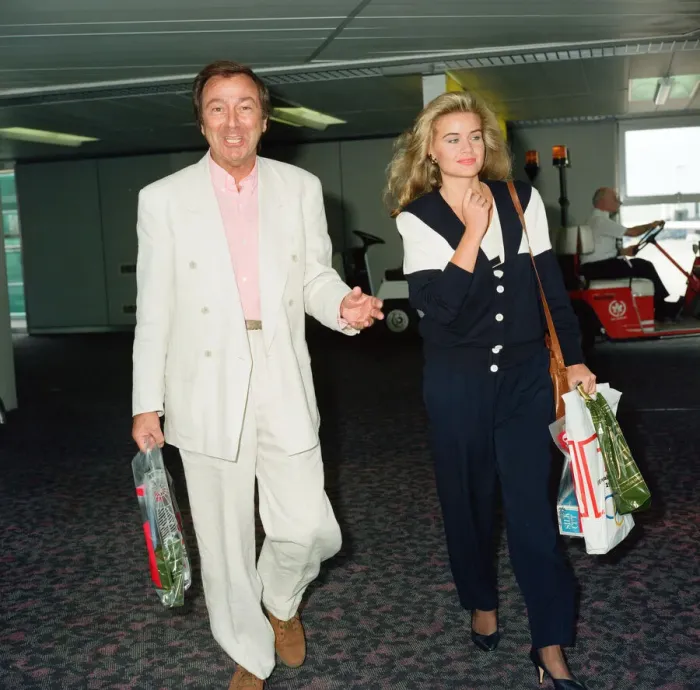 Framed Print : Des O Connor and girlfriend Jodie Brooke Wilson and Heathrow Airport Framed Print : Des O Connor and girlfriend Jodie Brooke Wilson and Heathrow Airport