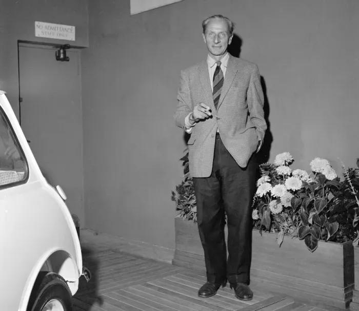 Framed Print : Designer of the British mini motor car Alec Issigonis, with one of the first cars which Framed Print : Designer of the British mini motor car Alec Issigonis, with one of the first cars which