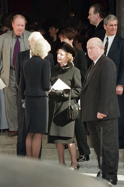 Diana Donovan the widow of photographer Terence Donovan talking to Margaret Thatcher at