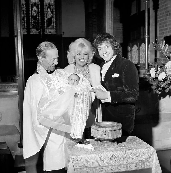 Diana Dors and her husband Alan Lake at the Christening of