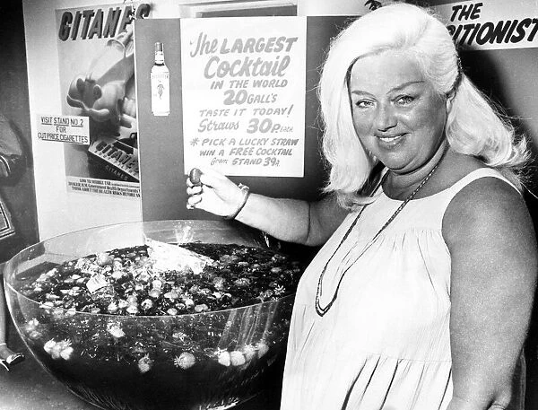 Diana Dors(51) appears at the International Food, Wine and Kitchen Exhibition at