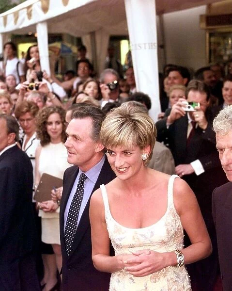 Diana, Princess of Wales, arrives with Lord Hindlip, Chairman of Christie