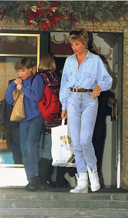 Framed Print : Diana, Princess of Wales carries a bag for her son Prince William as he leaves