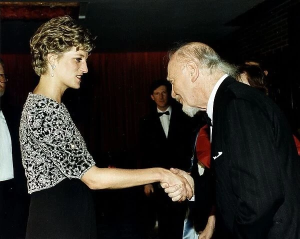 Diana, Princess of Wales is greeted by Irish singer Josef Locke as she arrives for