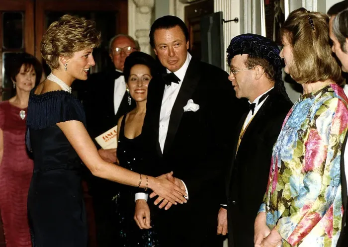 Framed Print : Diana, Princess of Wales is greeted by singer Elton John for a charity performance of Framed Print : Diana, Princess of Wales is greeted by singer Elton John for a charity performance of