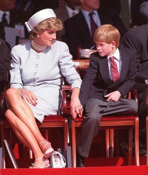 Diana Princess of Wales holding the hand of her son Prince Harry at a ceremony in Hyde