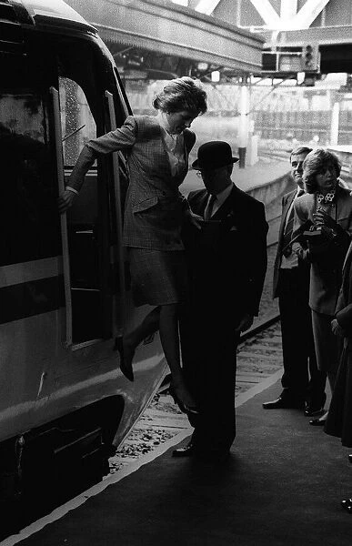 Diana, Princess of Wales jumps off a train at Paddington Station, London