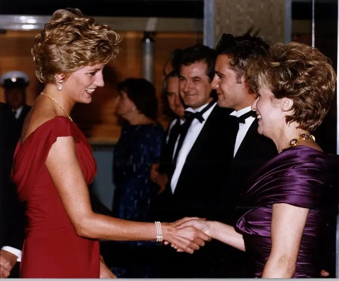 Framed Print : Diana, Princess of Wales shakes hands with actress Julie Walters as she attends Framed Print : Diana, Princess of Wales shakes hands with actress Julie Walters as she attends
