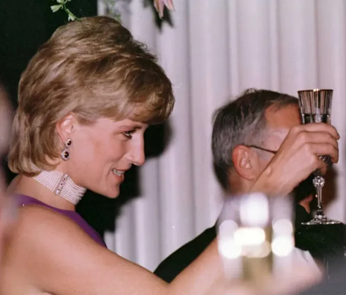 Framed Print : Diana, Princess of Wales, takes the toast at a charity gala dinner held in her honour
