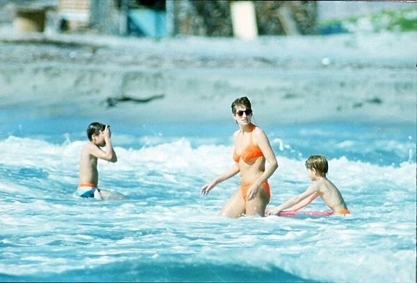 Diana, Princess of Wales in the water with her children Prince William