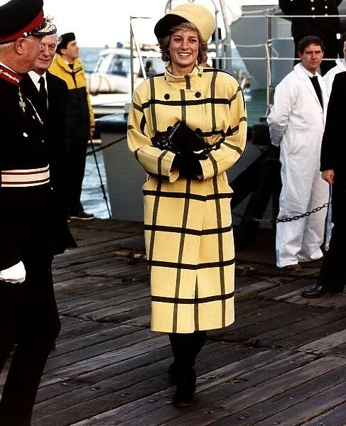 Diana, Princess of Wales, wearing a yellow and black woollen coat in blanket checks