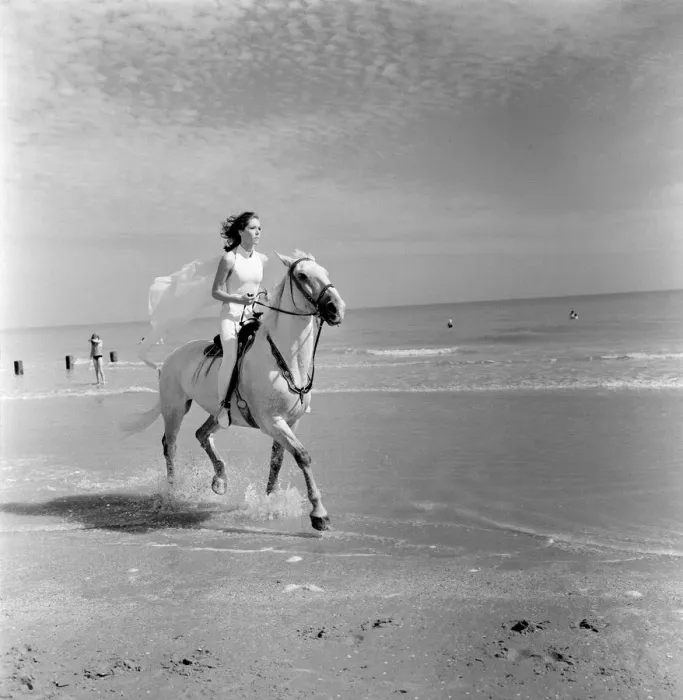 Framed Print : Diana Rigg, who plays Emma Peel, pictured riding a white horse across the beach at St Framed Print : Diana Rigg, who plays Emma Peel, pictured riding a white horse across the beach at St