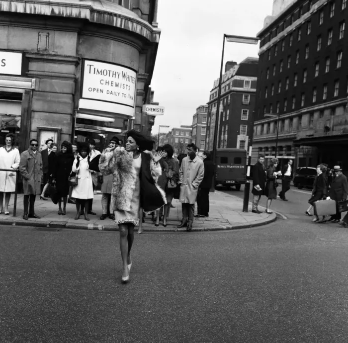 Framed Print : Diana Ross walking ahead of the rest of the Motown Group on Oxford Street London Framed Print : Diana Ross walking ahead of the rest of the Motown Group on Oxford Street London