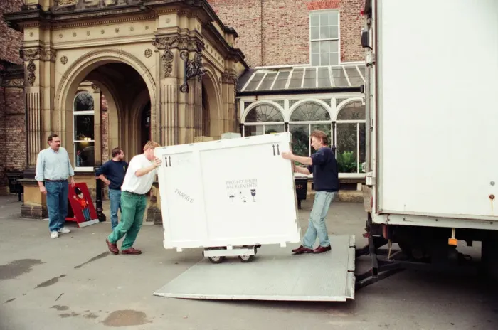 Framed Print : The Dice Players, is moved from its home in Preston Hall Museum in readiness for its trip Framed Print : The Dice Players, is moved from its home in Preston Hall Museum in readiness for its trip