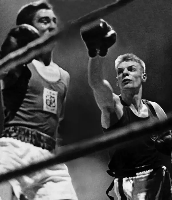 Framed Print : Dick McTaggart boxer throwing punch boxing during fight against ropes. Circa 1958 Framed Print : Dick McTaggart boxer throwing punch boxing during fight against ropes. Circa 1958