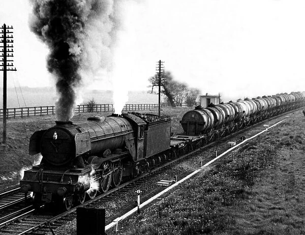 One of the diminishing number of steam engines still operating is seen hauling a freight