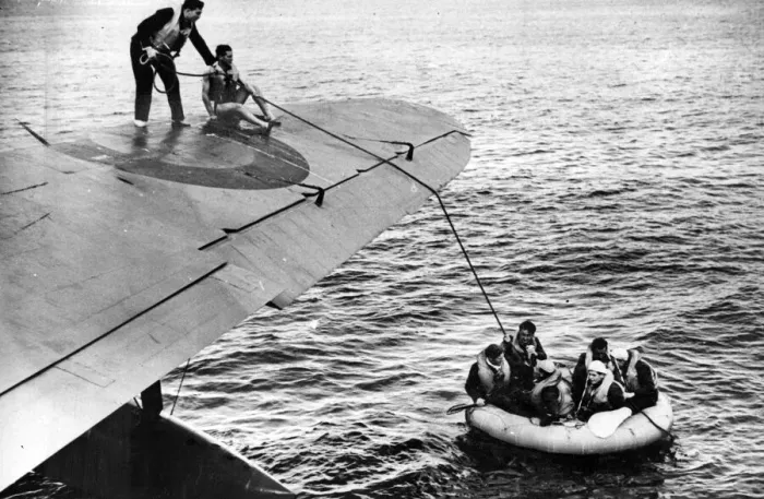 Framed Print : Dinghy drawn alongside a rescue aircraft. Circa July 1942 Framed Print : Dinghy drawn alongside a rescue aircraft. Circa July 1942