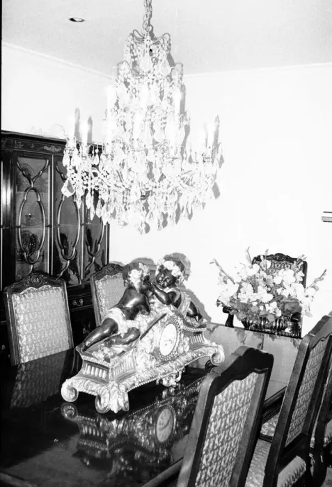 Framed Print : The dining room with its chandelier and ornamental clock September 1983