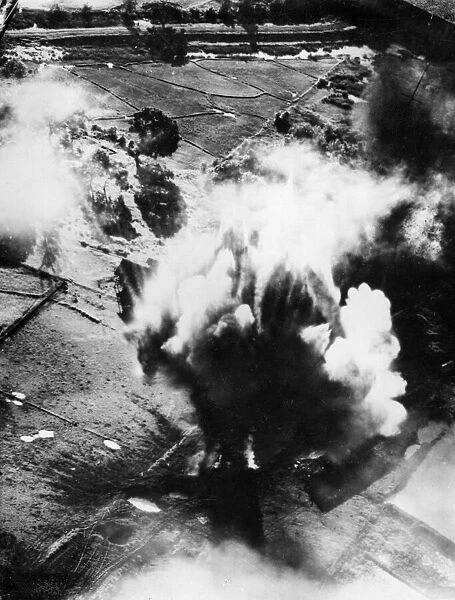 A direct hit from an RAF bomber explodes in a cloud of dust