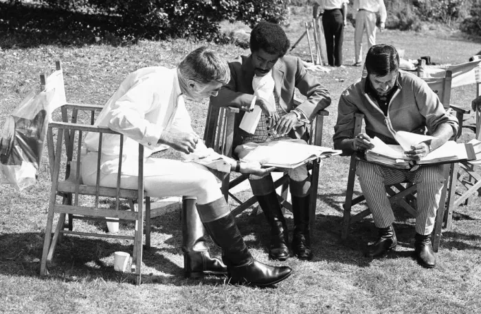 Framed Print : Director Jerry Lewis (right) seen here reading the script with Sammy Davis Junior Framed Print : Director Jerry Lewis (right) seen here reading the script with Sammy Davis Junior