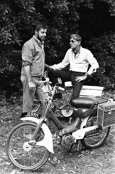 Director Jerry Lewis seen here with Peter Lawford whilst on location at Eastnor Castle