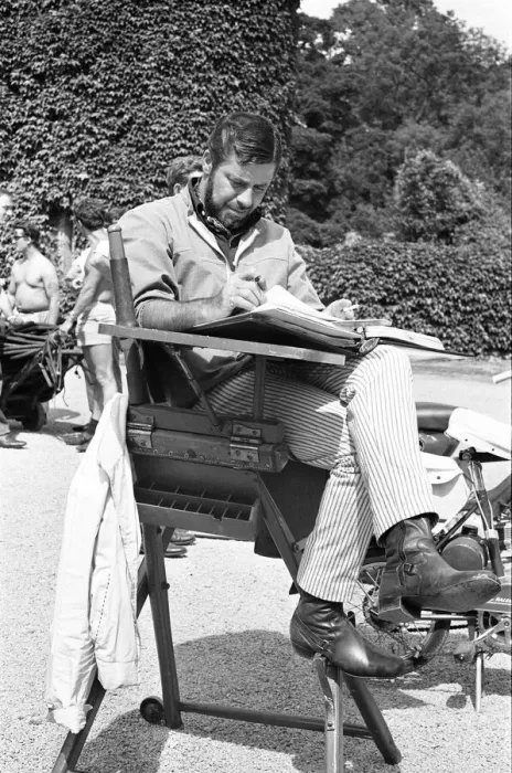 Framed Print : Director Jerry Lewis seen here reading the script whilst on location at Eastnor Castle
