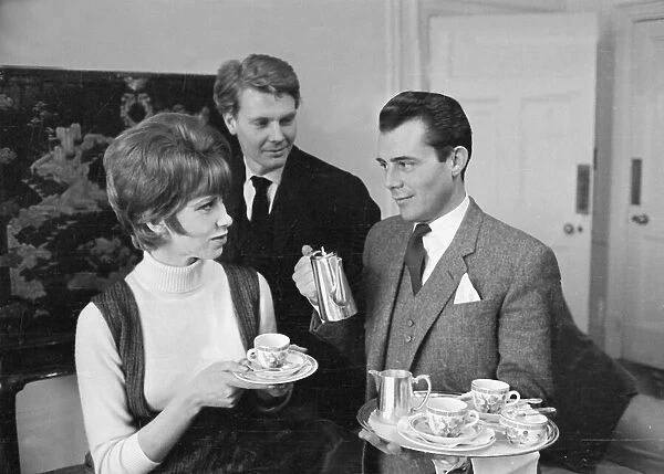 Dirk Bogarde with movie stars of the film The Servant - Wendy Craig - during a tea