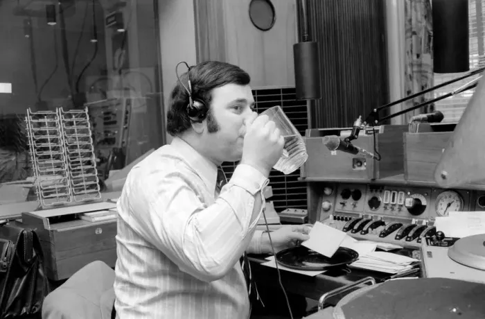 Framed Print : Disc Jockey Terry Wogan enjoys a large jug of water during broadcast of his afternoon Framed Print : Disc Jockey Terry Wogan enjoys a large jug of water during broadcast of his afternoon