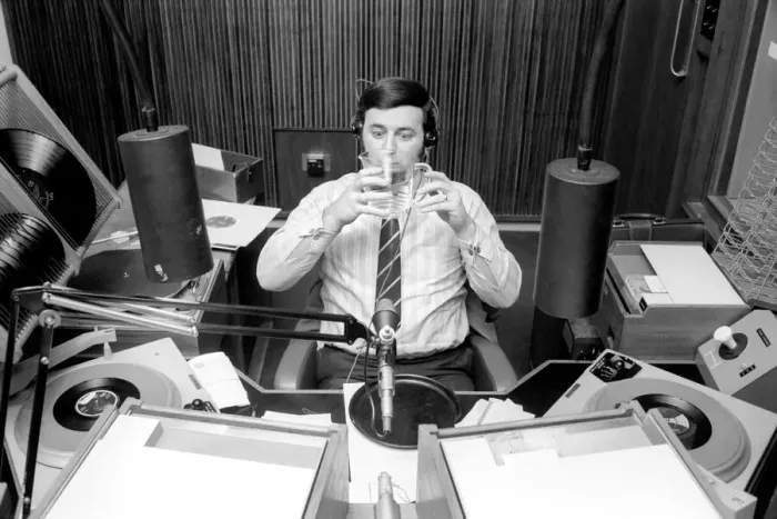 Framed Print : Disc Jockey Terry Wogan enjoys a large jug of water during broadcast of his afternoon Framed Print : Disc Jockey Terry Wogan enjoys a large jug of water during broadcast of his afternoon
