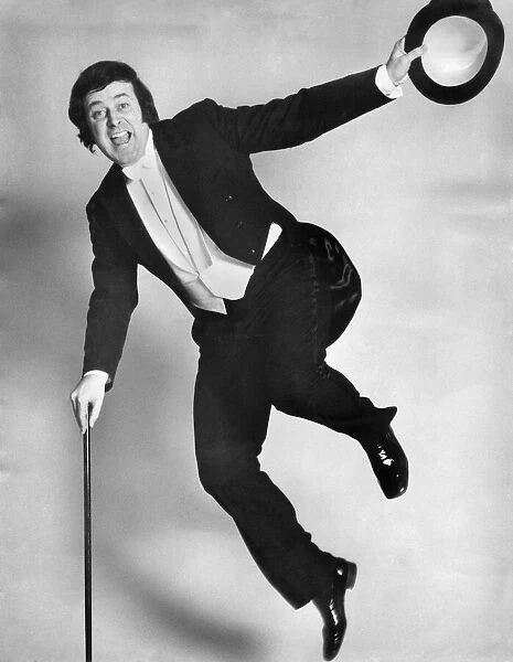 Disc Jockey Terry Wogan gets in the mood for his new compere job on BBC TV