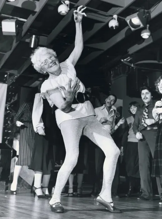 Framed Print : Disco dancing 93 year old Beattie Bradnam dances on the disco dance floor wearing a Framed Print : Disco dancing 93 year old Beattie Bradnam dances on the disco dance floor wearing a