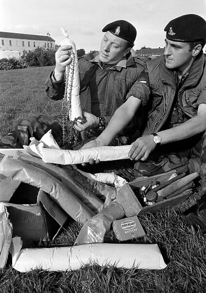 Dismantled Bomb. Members of Royal Army Ordanance Corps with Dismantled 50lb Bomb