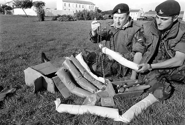 Dismantled Bomb. Members of Royal Army Ordanance Corps with Dismantled 50lb Bomb
