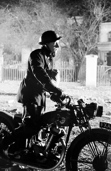 Dispatch rider on Telford Avenue, Streatham. 8th March 1941